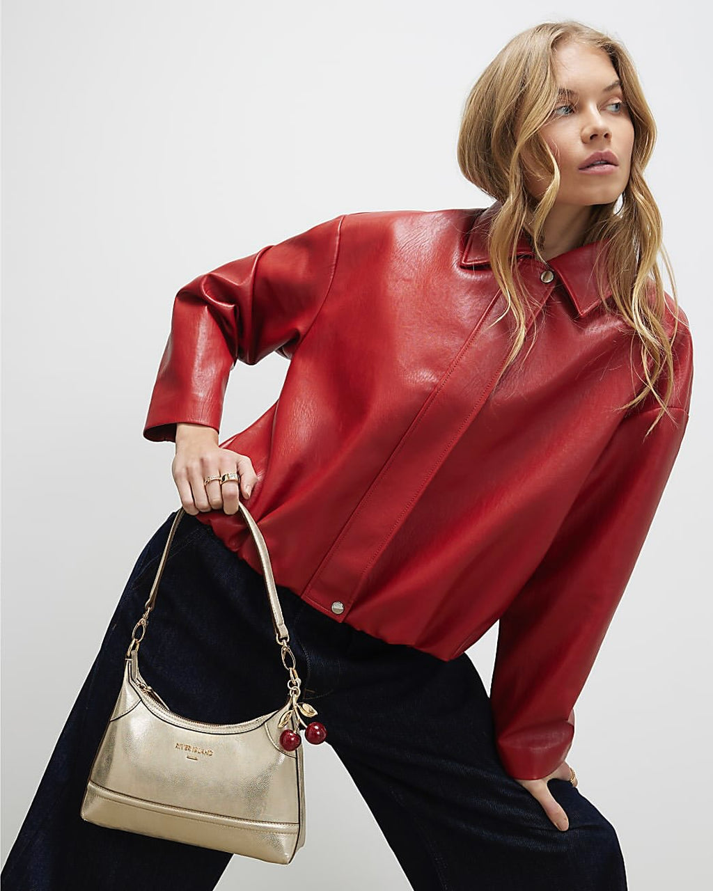 River Island metallic gold bag