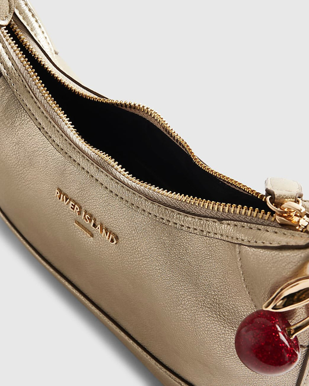 River Island metallic gold bag